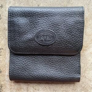 Black Fossil leather bifold wallet snap closure